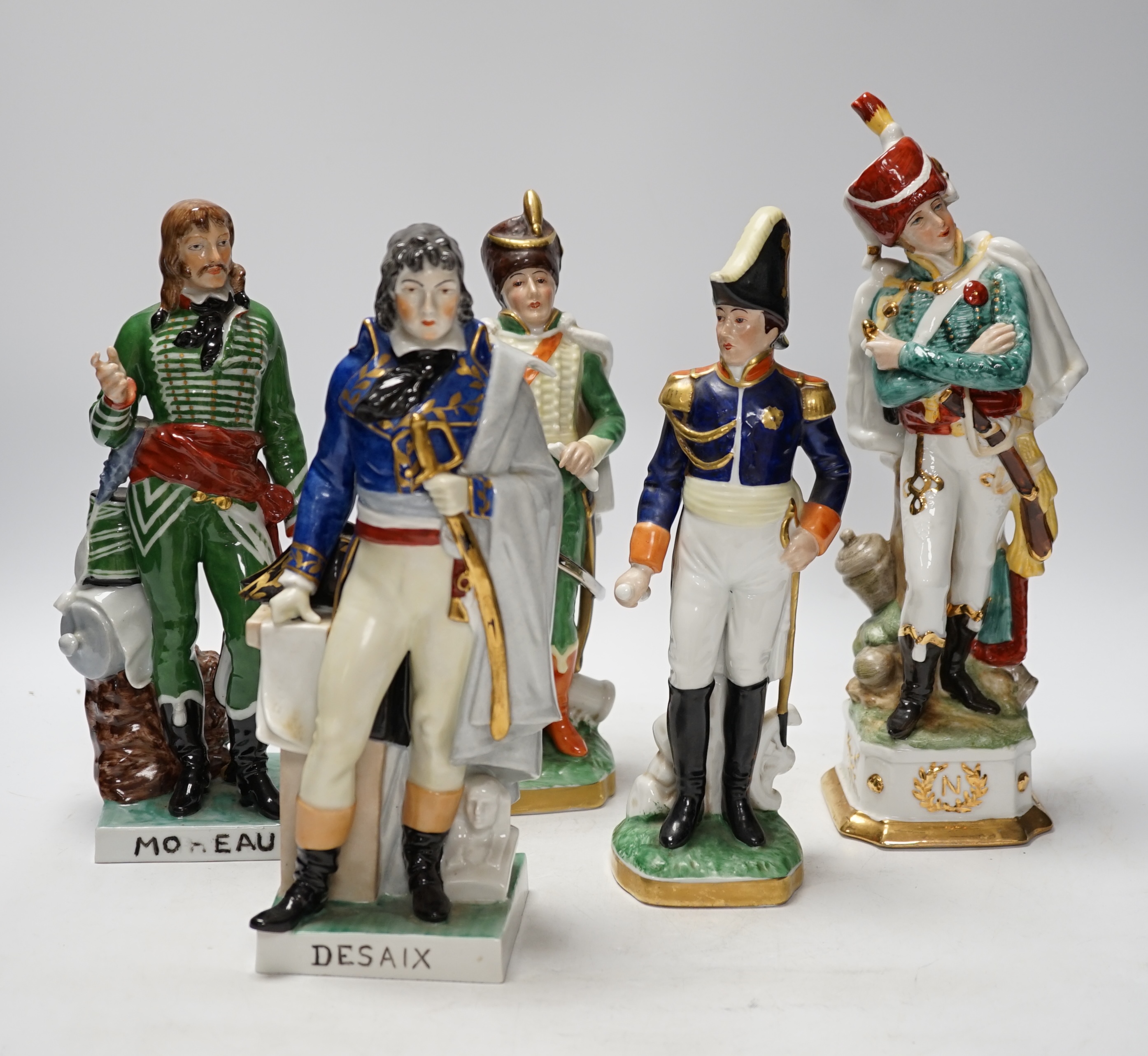 A group of thirteen naval/military figures, tallest 32cm high